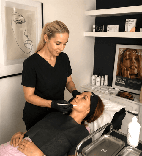 Marta treating a client